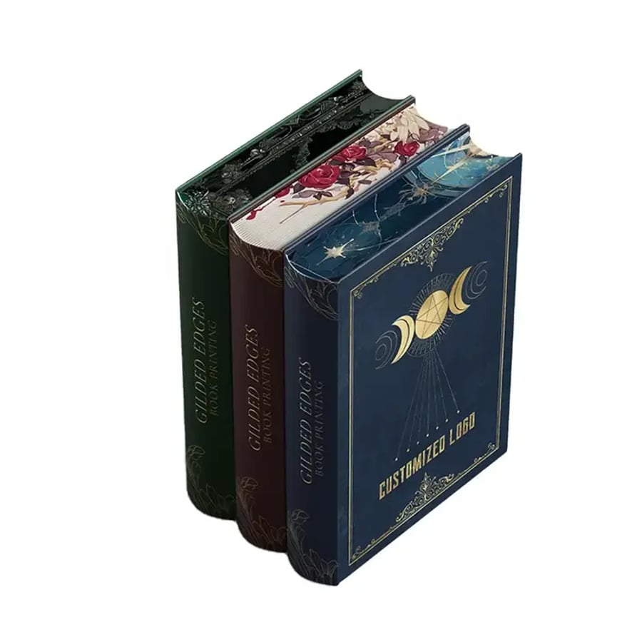 A set of custom hardcover books with full color printed edges and foil stamped covers.