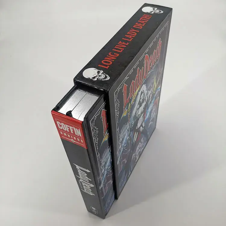Deluxe hardcover book with metallic silver gilded edges, housed in a custom slipcase