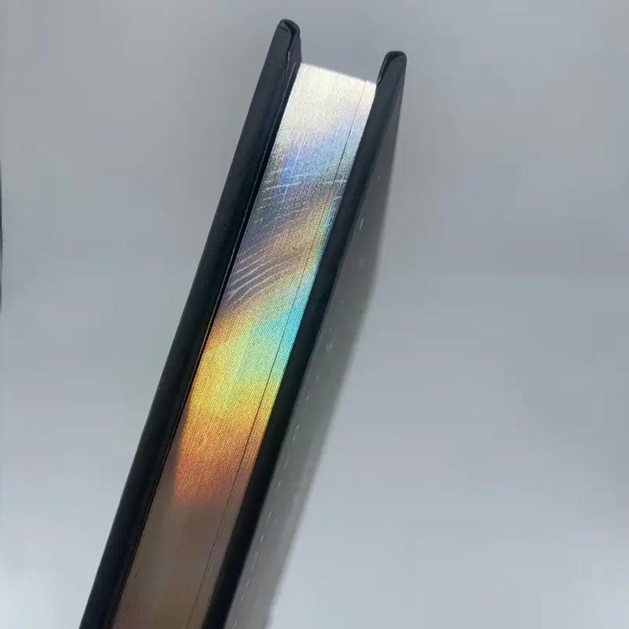 Hardcover book with holographic edges