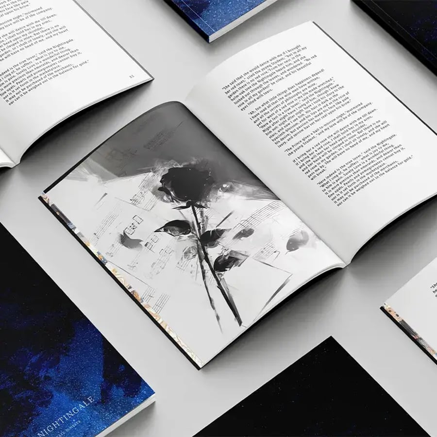 hardcover books opened on a table