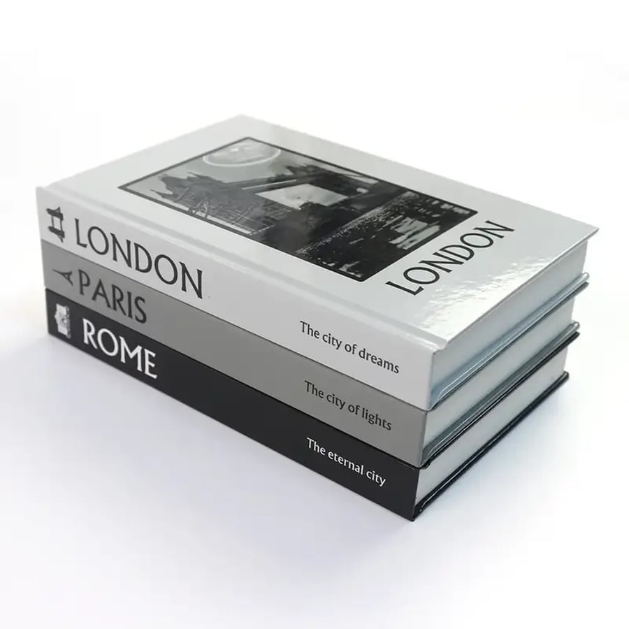 Three hardcover books with high gloss laminated covers