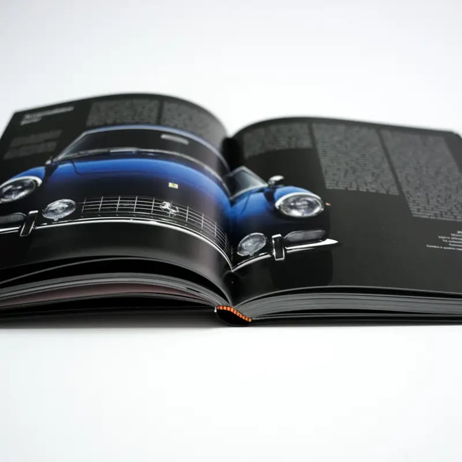 Open luxury automotive coffee table book