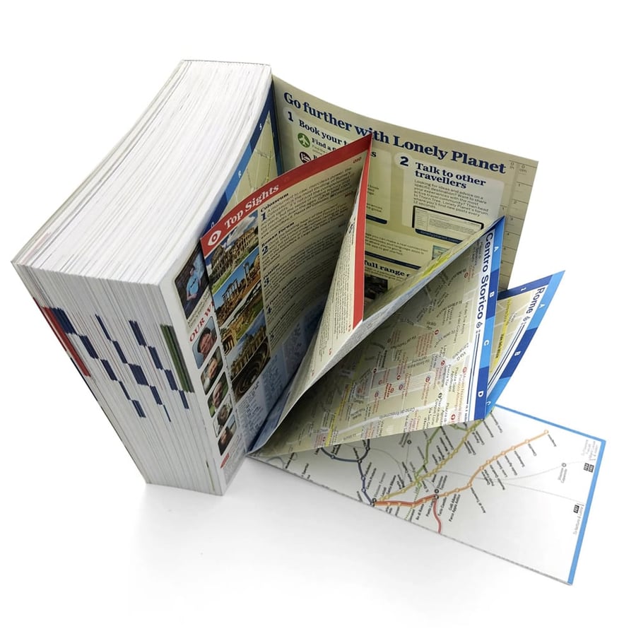 Perfect bound book with fold out maps and full color printing
