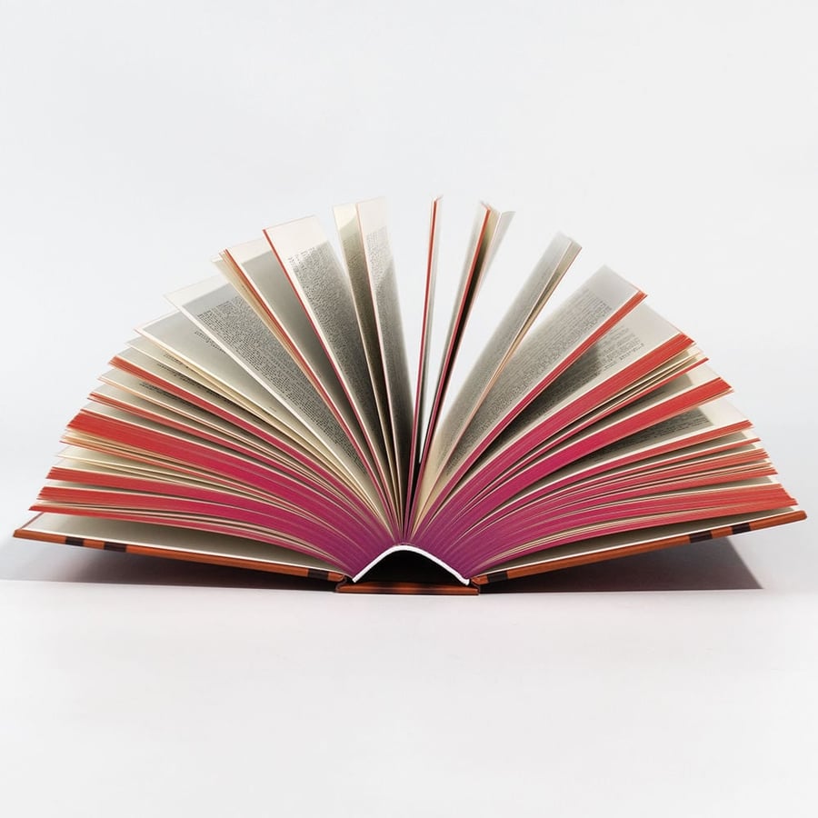 Sewn bound book with gradient colored edges and smooth layflat opening