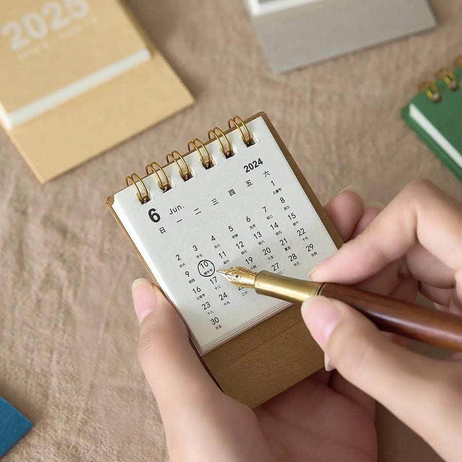 Mini kraft calendar with gold twin ring binding
