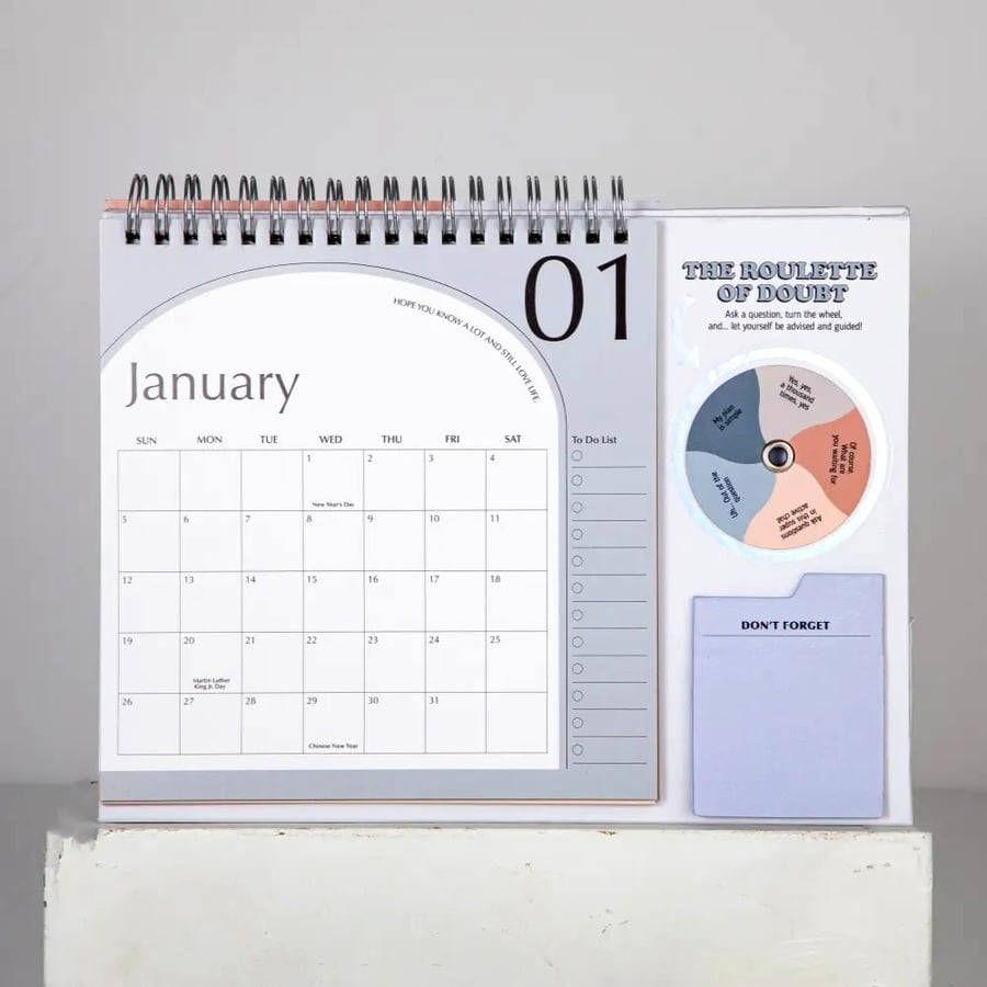 Monthly wall calendar with writable date blocks