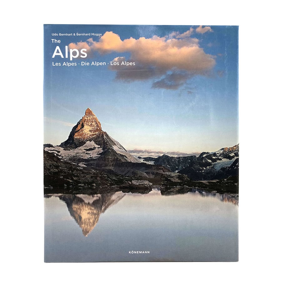 Travel photography book featuring mountain landscapes