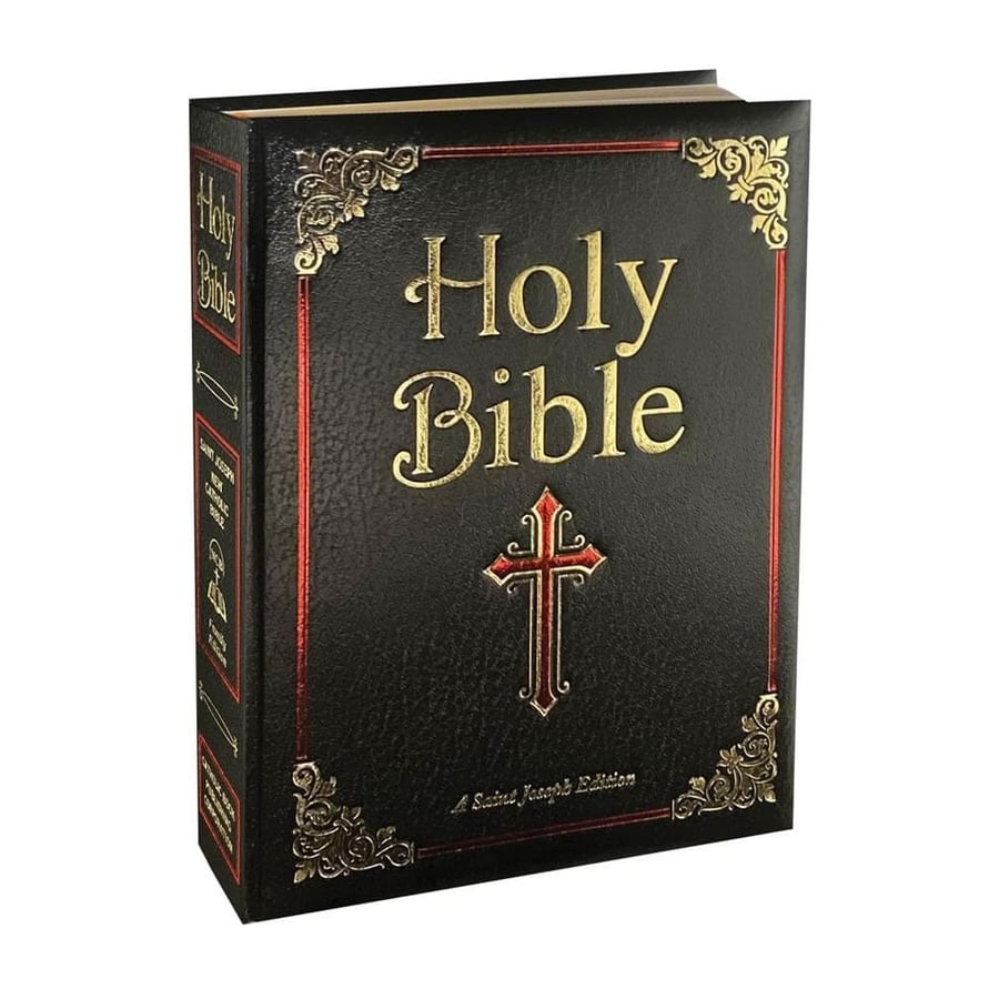 Black hardcover Bible with gold cross and ornate border design