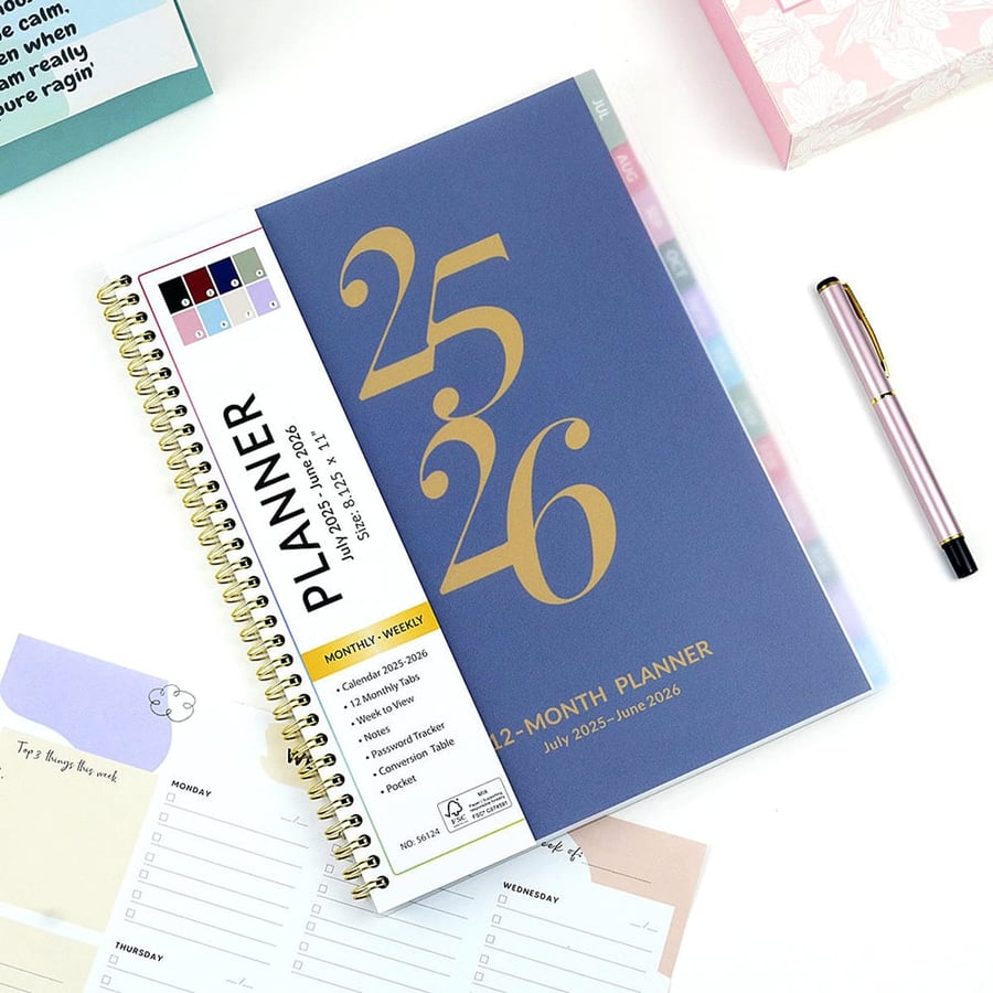 Wire O planner with laminated cover and tab dividers for organization