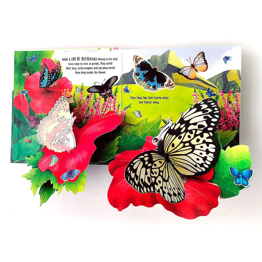 Vibrant 3D pop-up scene with butterflies emerging from flowers.